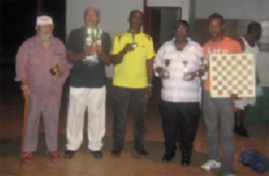 Respective winners of the Trophy Stall-sponsored National Draughts competition. 