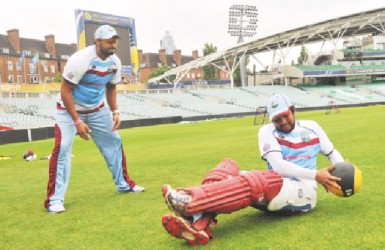 Ravi Rampaul and Ramnaresh Sarwan going through their exercise drills yesterday. (Photo courtesy of WICB media)