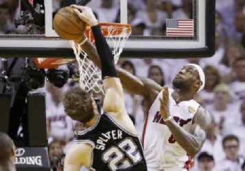 REJECTED! Miami Heat small forwards LeBron James helped his team repel the San Antonio Spurs offense. (Reuters photo) 