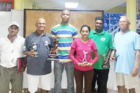  Trophy Stall representative Leroy Jack (centre) with prize winners. Tournament champion Colin Ming was unavoidably absent.