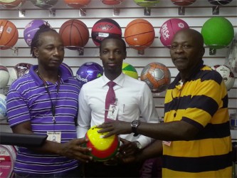 Giftland Public Relations Manager Compton Bobb (centre) flanked by Stabroek Warriors Sports Roy Ridley (left) and tournament coordinator O’neil Durant (right) at the Inter-Market Futsal competition launch