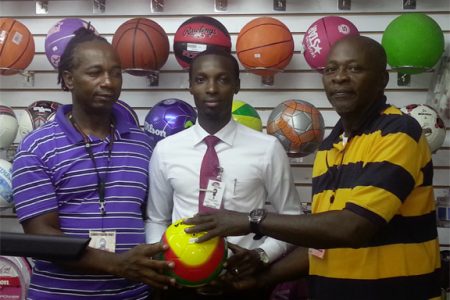 Giftland Public Relations Manager Compton Bobb (centre) flanked by Stabroek Warriors Sports Roy Ridley (left) and tournament coordinator O’neil Durant (right) at the Inter-Market Futsal competition launch