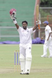 West Indies `A’ team batsman Narsingh Deonarine celebrates reaching three figures yesterday during the second test against Sri Lanka in Arnos Vale yesterday. (Photo courtesy of WICB media)