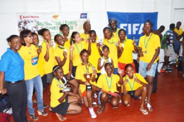 Tutorial High School after winning the Scotiabank/Pepsi Schools Football National Championship title yesterday evening at the Ministry of Education ground, Carifesta Avenue.  