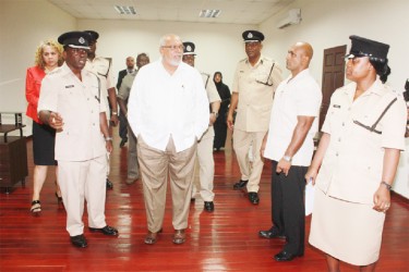 The President in discussions with officers in the Information Technology room of the centre (Photo by Arian Browne)