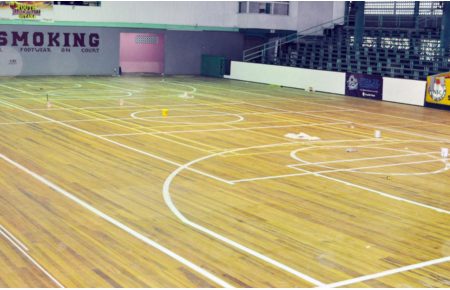 ALMOST FINISHED! The Cliff Anderson Sports Hall Floor has been painted to facilitate the playing of basketball and other indoor sports. (Orlando Charles photo)