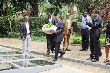 Minister of Natural Resources and the Environment Robert Persaud about to lay a wreath at the Rwanda Genocide Memorial (Photos courtesy of UNDP) 