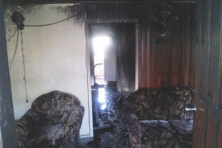 The burnt bottom flat of the home.