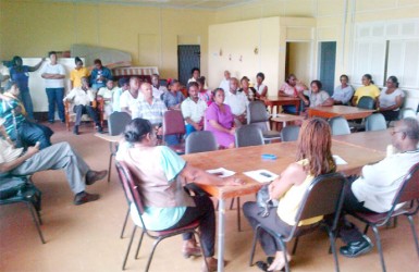 University of Senior Staff Association (UGSSA) President Patsy Francis (left), UGSSA Vice-President Melissa Ifill (centre) and President of the University of Guyana Workers Union (UGWU) Bruce Haynes (right) address members of the union during yesterday’s meeting. 