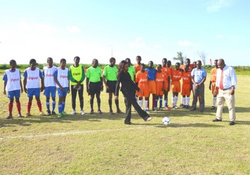 Digicel’s head of Marketing Jacqueline James kicks the ball to declare the tournament open.  