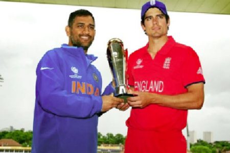 India captain Mahendra Singh Dhoni and England captain Alastair Cook want sole possession of the Champions Trophy. (BBC photo)