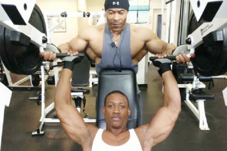 Kerwin ‘Chisel’ Clarke in training with Guyanese world renowned bodybuilder, Hugh Ross at the Brooklyn Sports Club last week.