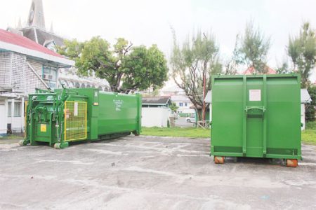 White elephants: The two compactor sections of the trucks that were donated by the Ministry of Local Government to City Hall last month (Photo by Arian Browne)
