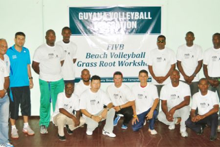  FIVB Instructor, Mauro Hernandez, third from left with the  local players yesterday.