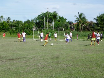 Action in the Digicel/Powerade National U-18 Schools Football championships between Craig Secondary and St. Cuthbert’s Secondary yesterday.    