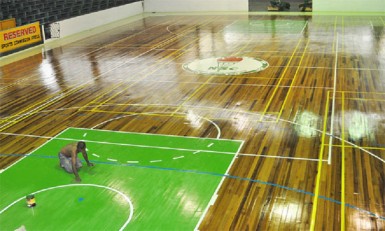  A worker polishes the newly constructed surface  