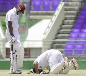 Assad Fudadin gives thanks after reaching his century against Sri Lanka. 