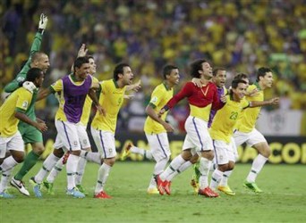 Brazil’s players celebrate after winning their Confederations Cup final soccer match against Spain at the Estadio Maracana in Rio de Janeiro  yesterday.Credit: REUTERS/Jorge Silva 