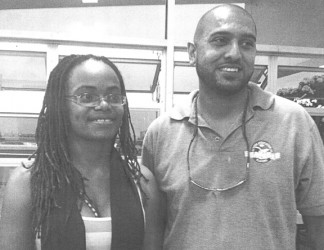 National defending champion, Abigail McDonald (left) and the leader of the Courts National Scramble Championship Moen Gafoor last evening after the second preliminary round concluded at the Bank of Guyana Roof Garden.