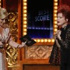 Singer Cyndi Lauper  (right) enters the stage to accept the award for Best Original Score Written for the Theatre for "Kinky Boots" at Tony Awards in New York
