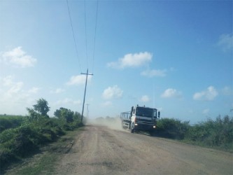 The driver of this heavy-duty truck was almost flying down the Burma Road, Region 5 with not a care in the world. Some residents blame speeding by drivers of these vehicles for the rapid deterioration of the road. 