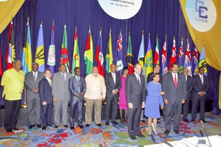 Portrait: The official photo at the conclusion of the 34th regular meeting of CARICOM Heads of Government in Trinidad and Tobago on Saturday. Also in photo are President of the Dominican Republic Danilo Medina (third from left) and Venezuelan President Nicolas Maduro (third from right) (OP/Sandra Prince photo)