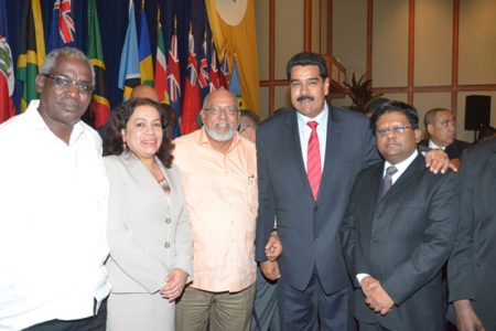 A meeting with Maduro: Guyana’s President Donald Ramotar (centre) with Venezuelan President Nicolas Maduro (second from right)  and Ministers of Finance, Dr Ashni Singh (right); Public Works, Robeson Benn (left) and Foreign Affairs Carolyn Rodrigues- Birkett at the 34th Caricom Heads of Government Conference in Trinidad. (GINA photo)