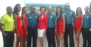 Windies captain Dwayne Bravo (fifth from right) with Team Manager Richie Richardson (fourth from left), Chris Gayle (third from right), Lendl Simmons (right), Tino Best (left), Digicel Head of Marketing Jacqueline James (fifth from left) and the Digicel models. (See story on page 31)