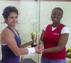 World ranked and National Women’s champion, Nicolette Fernandes collects the Women’s first place prize from Tandika Johnson (right). 