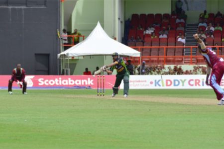 Shahid Afridi smashes Dwayne Bravo through the covers for four 