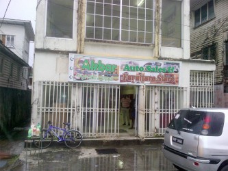 Akbar Auto Sales and Furniture on North Road, between Cummings Street and Orange Walk