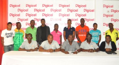 Sitting from left are Boyce and Jefford Classic Technical Delegate, Cornell Rose, Co-Chariman Edison Jefford, Digicel’s Sponsorship and Events Manager, Gavin Hooper, Co-Chairman Colin Boyce and Shanomae Blackmore, Secretary. Standing behind are local club athletes. (Photo by Orlando Charles)  