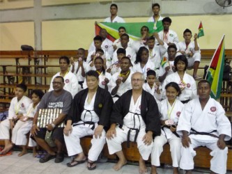 Association do Shotokan Karate Team with Team Manager John Peroune, Master Frank Woon-A-Tai and Sensei Amir Khouri in Barbados after the Championship.