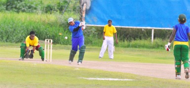  June Ogle smashes a delivery during her innings of 52 yesterday.