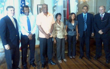 The United States Embassy last evening hosted a reception to welcome Chief of Party for the USAID Leadership and Democracy (LEAD) project Glenn Bradbury  here.  In photo Bradbury (right) poses with Members of Parliament and US Ambassador to Guyana Brent Hardt (left). 