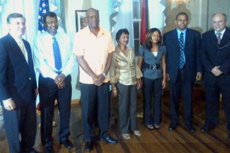 The United States Embassy last evening hosted a reception to welcome Chief of Party for the USAID Leadership and Democracy (LEAD) project Glenn Bradbury  here.  In photo Bradbury (right) poses with Members of Parliament and US Ambassador to Guyana Brent Hardt (left). 