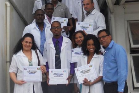 Some of the new doctors with officials of the Berbice Regional Health Authority after the graduation ceremony
