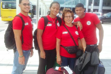 (L-R) Guyana’s 15th FINA World Championships team, Niall Roberts, Brittany van Lange, Coach Stephanie Fraser and Earlando McRae.