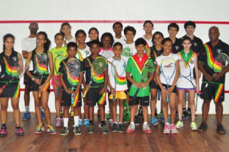 VICTORIOUS! Some members of the Guyana junior boys and girls’ squash team whichj won the overall team title for the ninth time at the annual Carribbean junior squash championships which ended yesterday in Trinidad and Tobago.