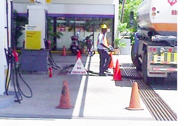 A fuel truck is seen here depositing fuel into the underground fuel tank at the Sol gas station on Vlissingen Road