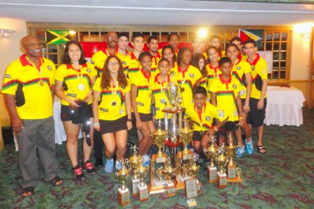 Overall Team title winners Guyana pose with their haul
