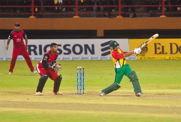 Guyana’s Amazon Warriors skipper Ramnaresh Sarwan smashes a six in his cameo knock. (Photos by Orlando Charles) 