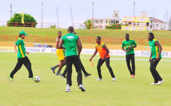  Tallawahs player Ahmad Shahzad in action during football practice 