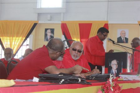 When Presidents meet: Former President Bharrat Jagdeo in talks with his successor President Donald Ramotar at the opening of the PPP’s 30th Congress yesterday at the JC Chandisingh Secondary School. (Photo by Arian Browne)