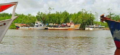 Boats docked at the Kumaka Landing