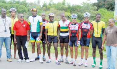 Winners and runners-up of the 10th annual Regan Rodrigues 50-mile road race pose with their spoils upon completion of yesterday’s event. (Orlando Charles photo)