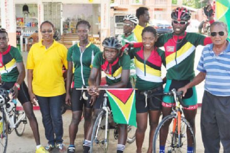 Guyana’s five- member team that dominated their Surinamese counterparts. From left Shaquel Agard, Toshawna Doris, Akeem Arthur,  Marica Dick and Hamzah Eastman. The cyclists are flanked by president of the GCF, Cheryl Thompson and National Cycling Coach, Hassan Mohamed (Orlando Charles photo)

