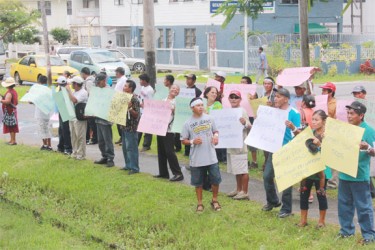 Indigenous protestors lined along Thomas Street opposite the Ministry of Amerindian Affairs, where they called for their concerns, including land rights, to be addressed. (Photo by Arian Browne) 