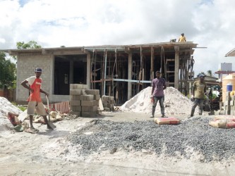 A supermarket  being constructed  in the village