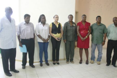 From left to right are Mortimer Mingo, Chairman of the new management board of the Linden Hospital Complex; Dr. Farouk Riyasat, Chief Executive Officer, Linden Hospital Complex; Valerie Patterson; Jonellor Bowen, Linden Town Clerk; Hazel Langellier, NIS, Linden; Maylene Stephens, Deputy REO, Region Ten; Raymond Sankar; and Patrick Dublin. Board member Dr. Pansy Armstrong, Region Health Officer is absent from photo.